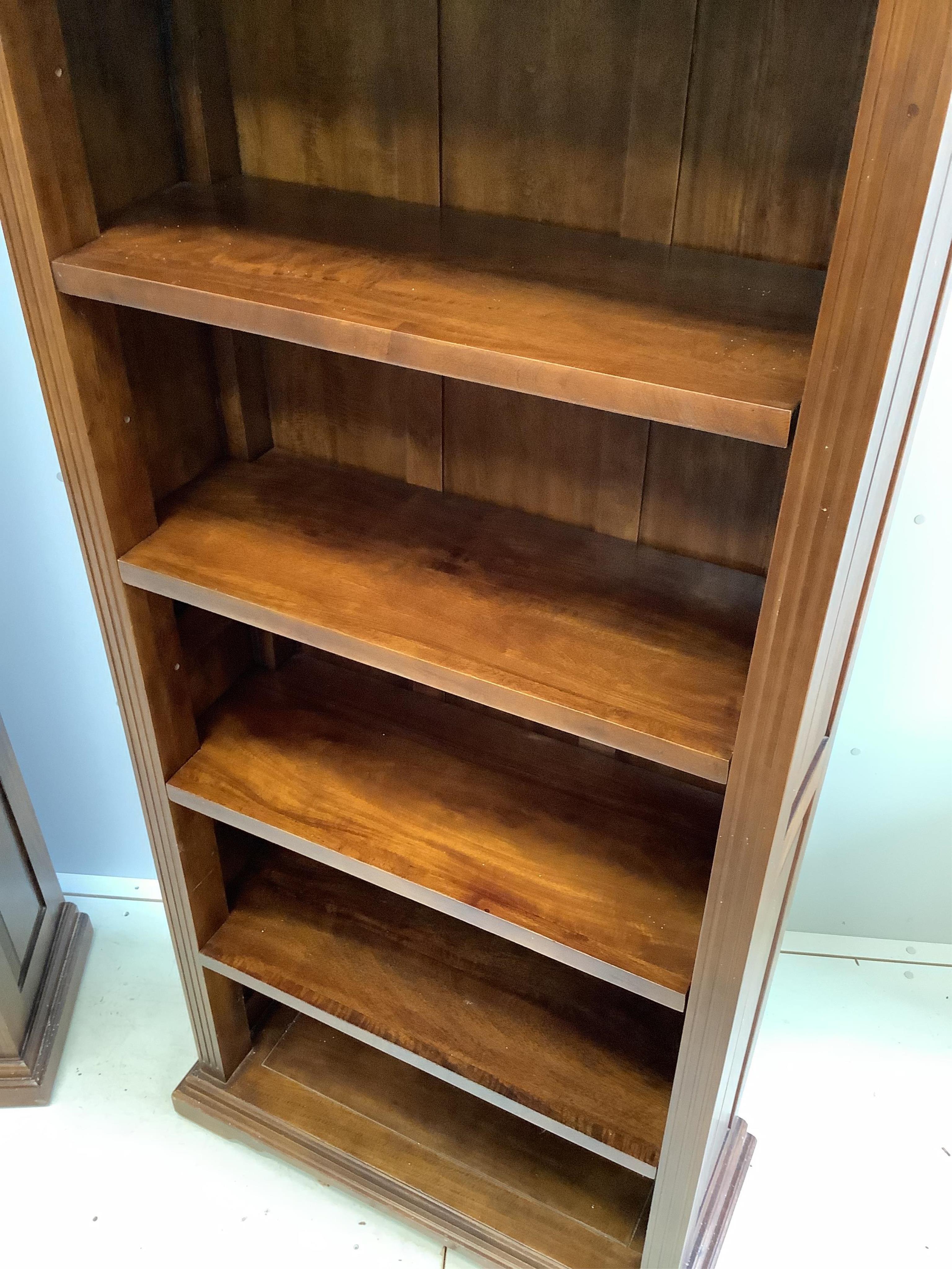 A pair of reproduction hardwood open bookcases, width 86cm, depth 36cm, height 179cm. Condition - good